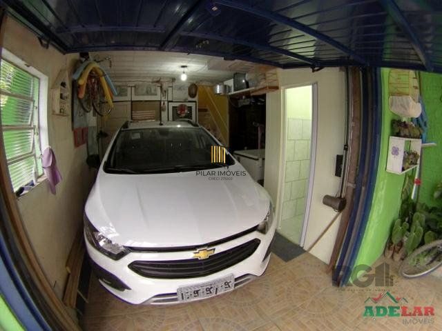 Casa 4 dormitórios no bairro Itapuã