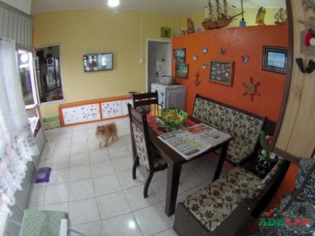 Casa 4 dormitórios no bairro Itapuã