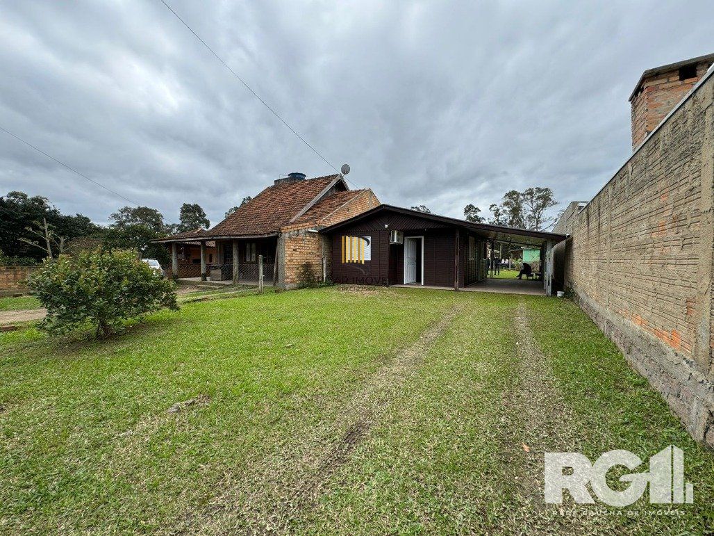Casa 2 dormitórios no bairro Itapuã - Pilar Imóveis