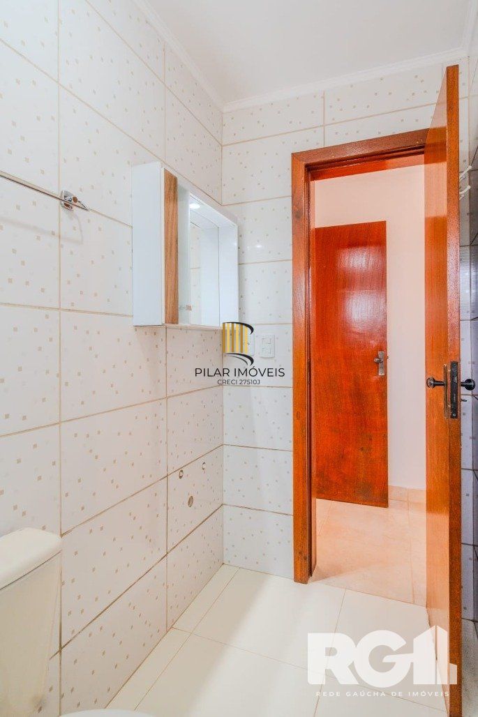 Casa 3 dormitórios no bairro Guarujá