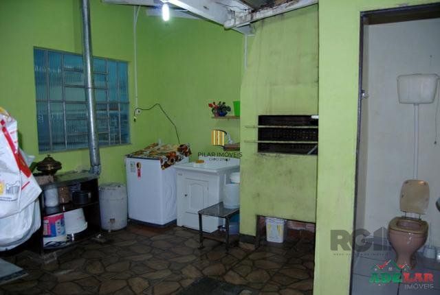 Casa 4 dormitórios no bairro Itapuã