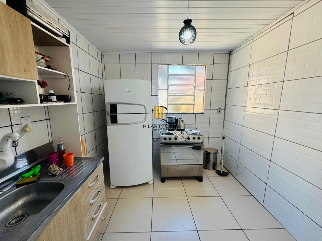 Casa 3 dormitórios no bairro Lami