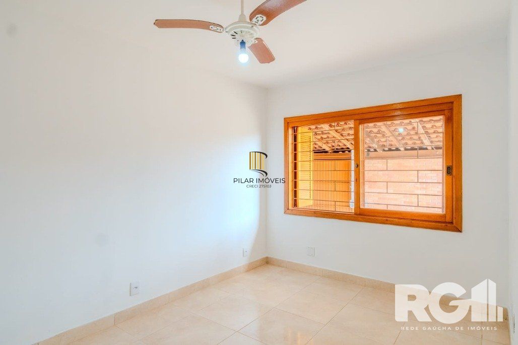 Casa 3 dormitórios no bairro Guarujá
