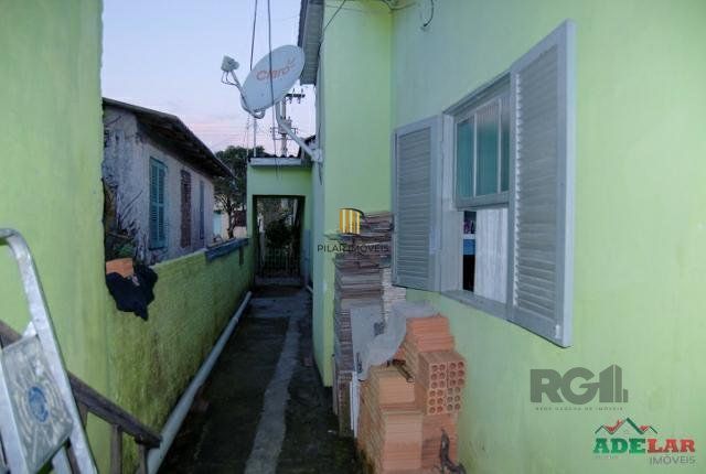 Casa 4 dormitórios no bairro Itapuã