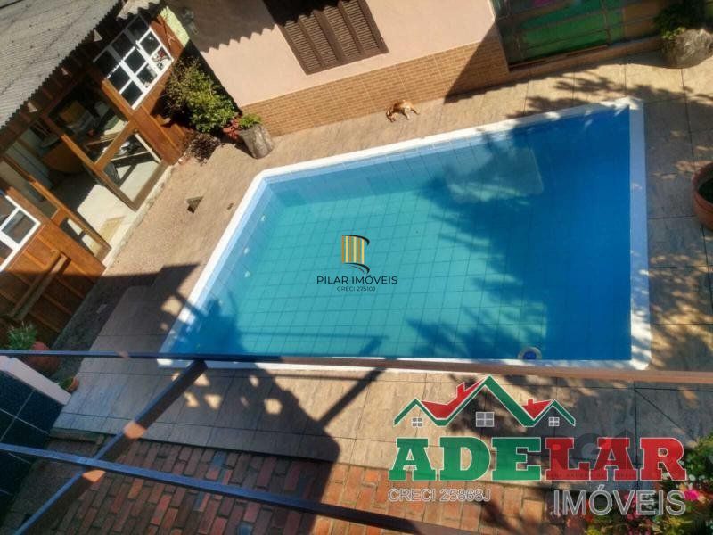 Casa 4 dormitórios no bairro Restinga