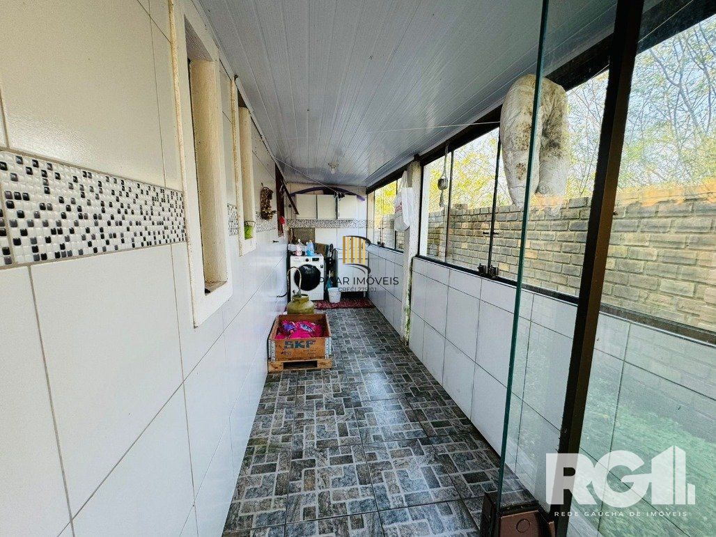 Casa 3 dormitórios no bairro Lami