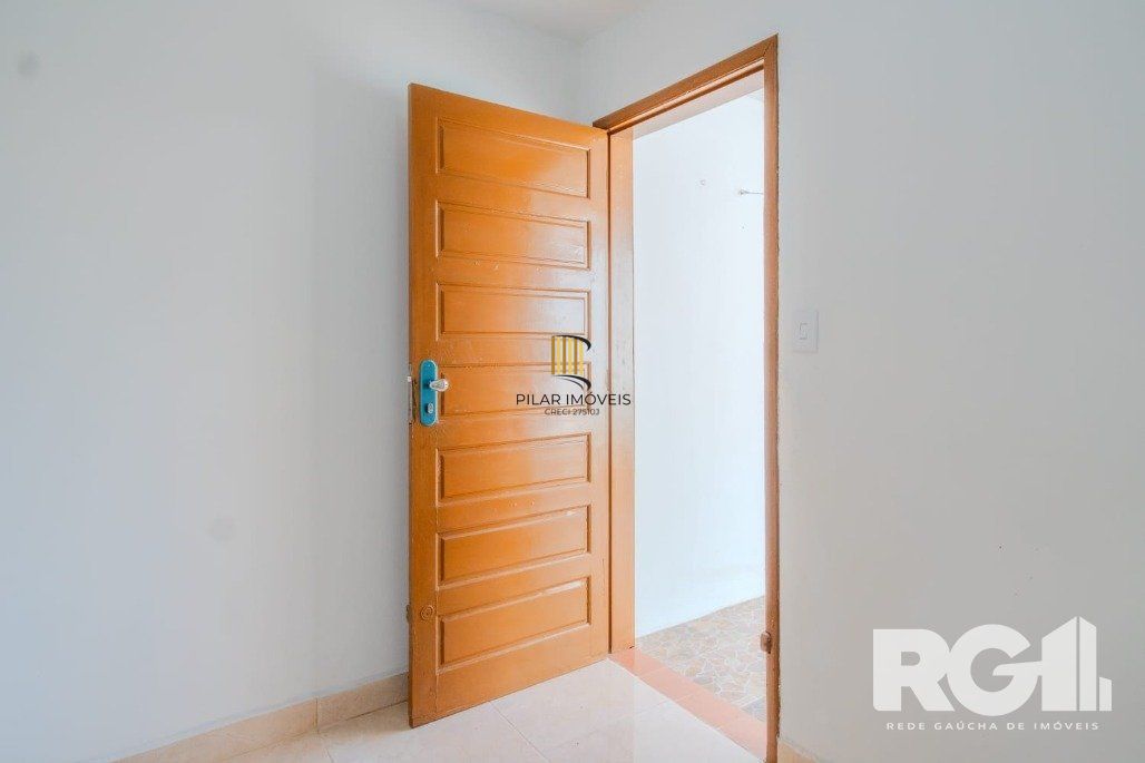 Casa 3 dormitórios no bairro Guarujá