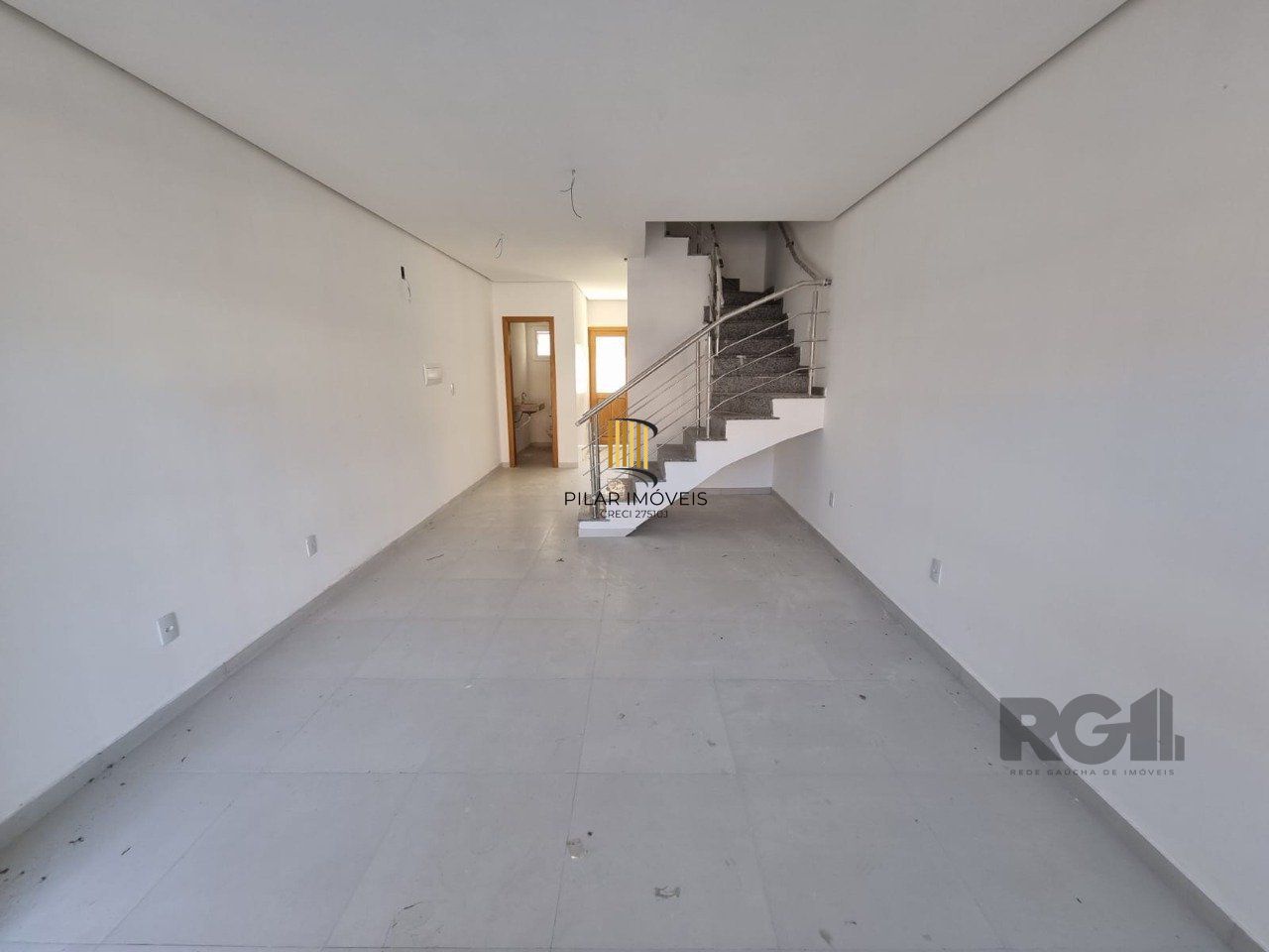 Casa 3 dormitórios no bairro Guarujá