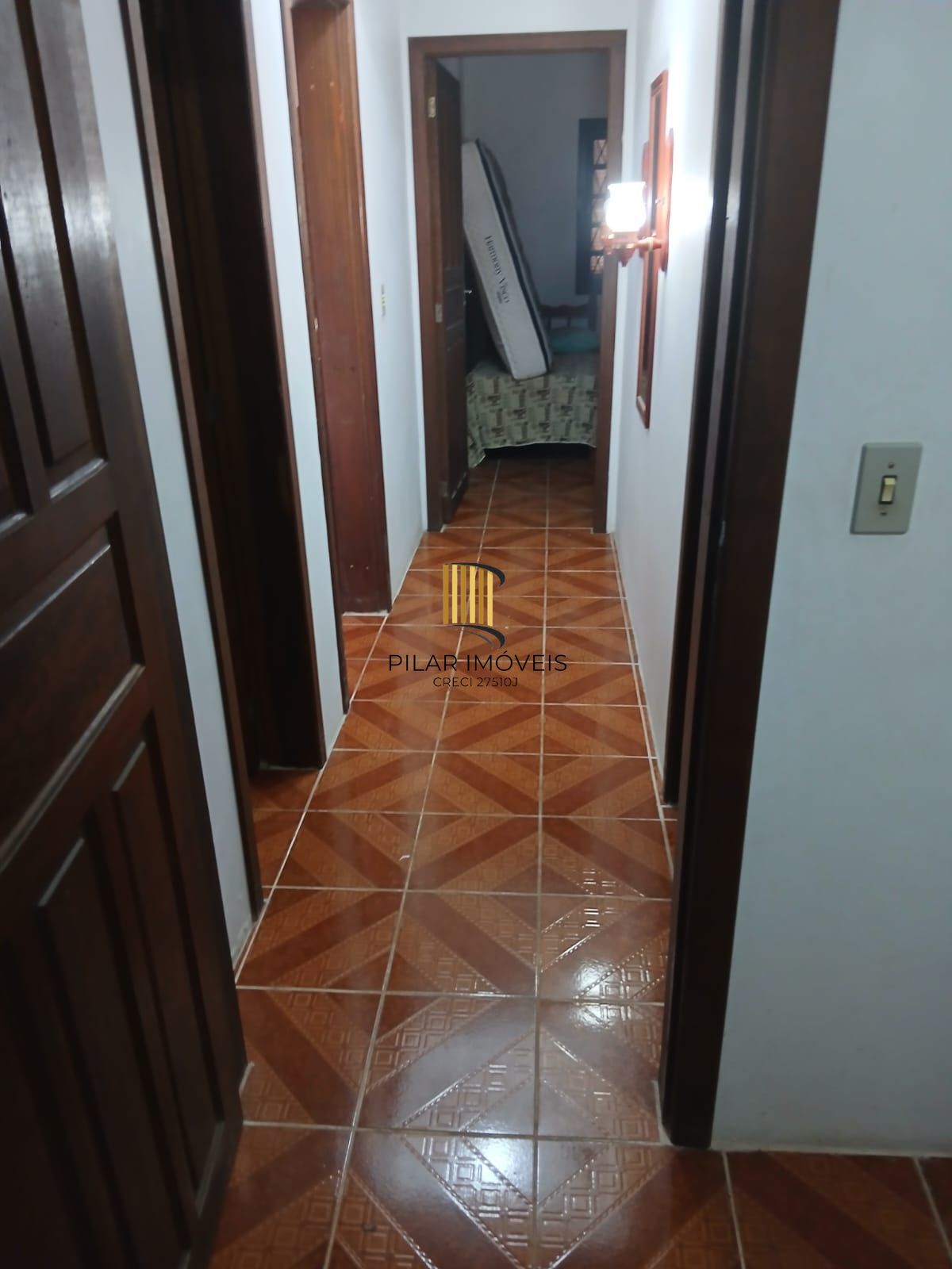 CASA A VENDA,  3 QUARTOS, PRÉDIO  COM DOIS PISOS NO BALNEARIO QUINTÃO EM PALMARES DO SUL.