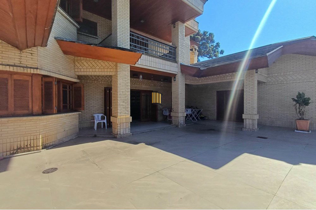 Casa 4 dormitórios no bairro Partenon