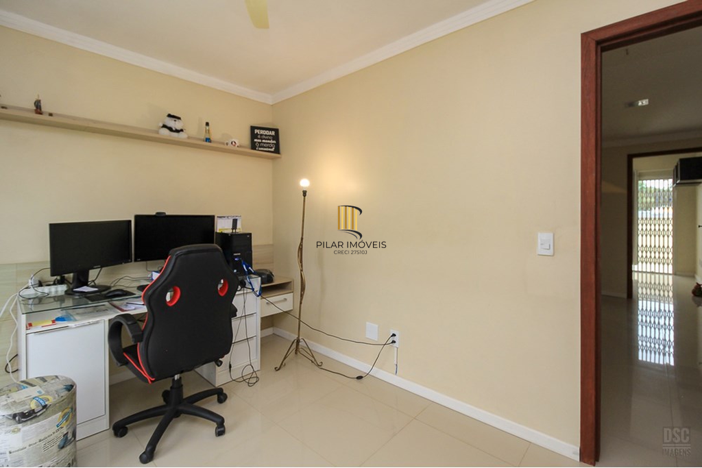 Casa 3 dormitórios no bairro Guarujá
