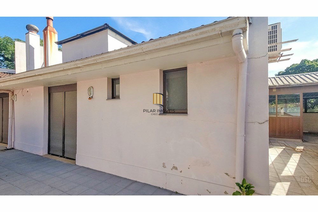 Casa 8 dormitórios no bairro Glória