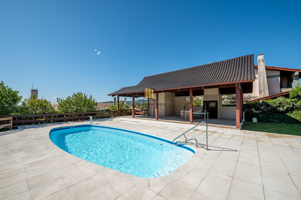 Casa de Condomínio 3 dormitórios no bairro Cavalhada