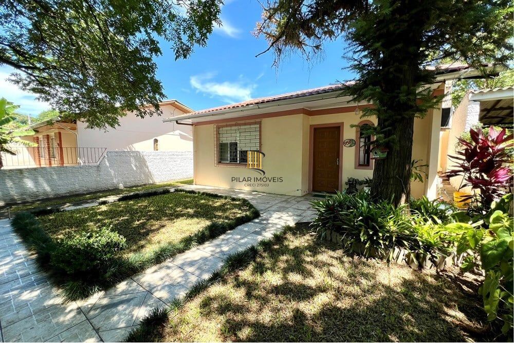 Casa 5 dormitórios no bairro Igara