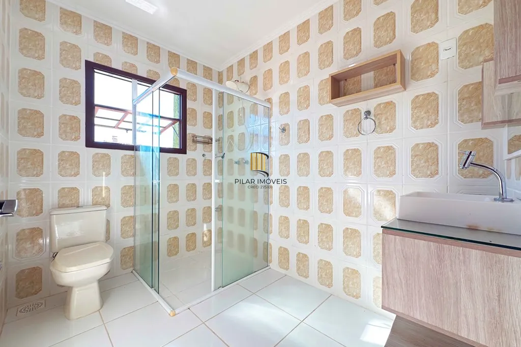 Casa 4 dormitórios no bairro Guarujá