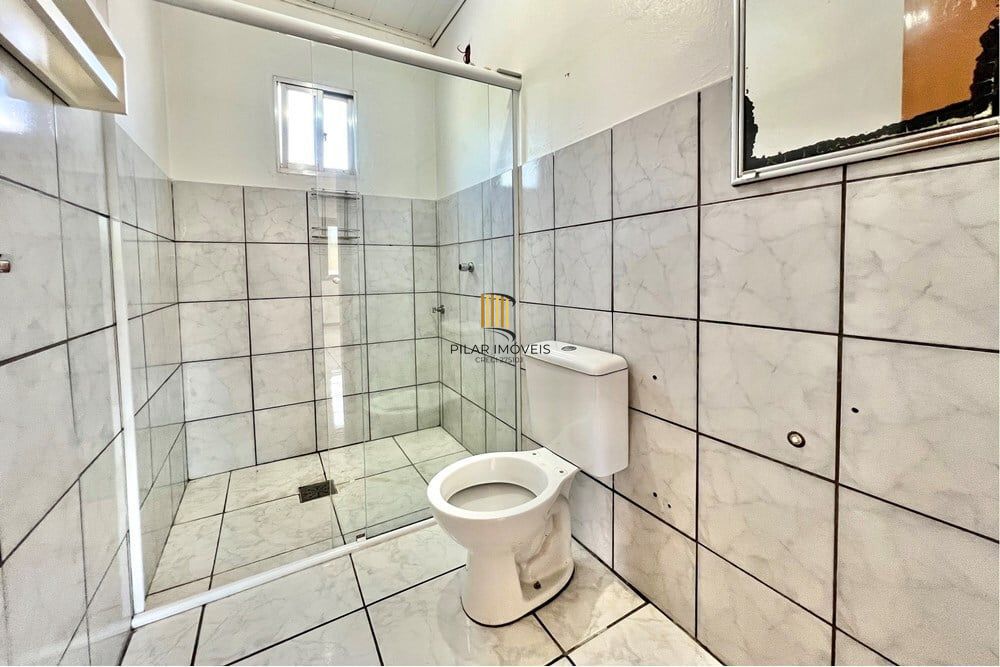 Casa 5 dormitórios no bairro Igara