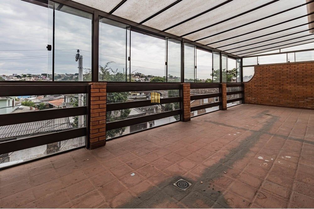 Casa 3 dormitórios no bairro Partenon