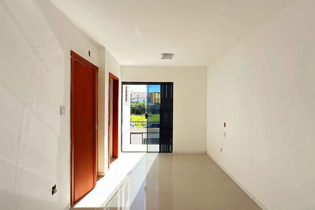 Casa 3 dormitórios no bairro Guarujá