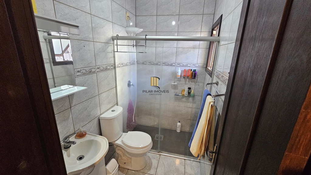 Casa 4 dormitórios no bairro Santo Antônio