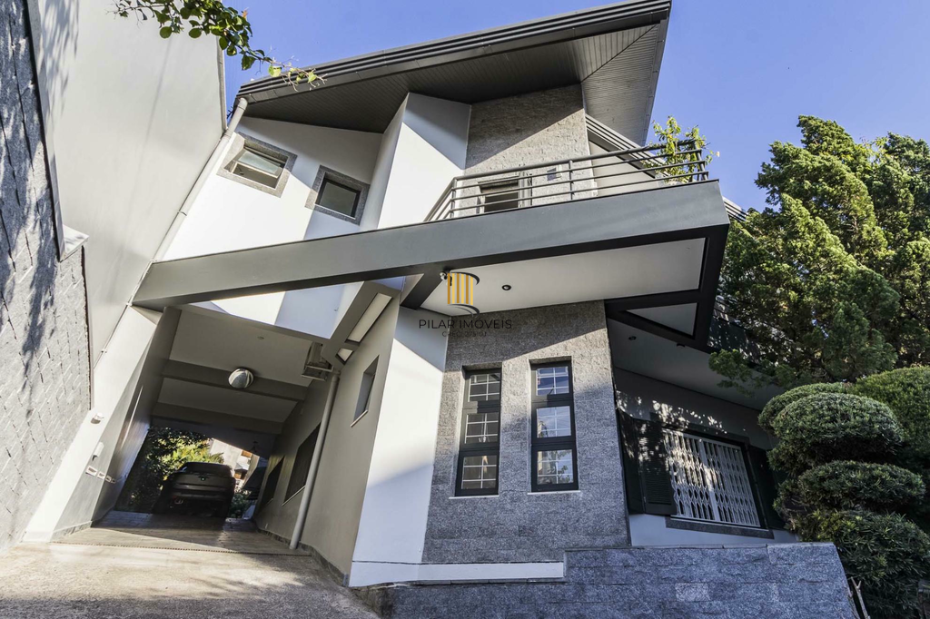 Casa 5 dormitórios no bairro Chácara das Pedras