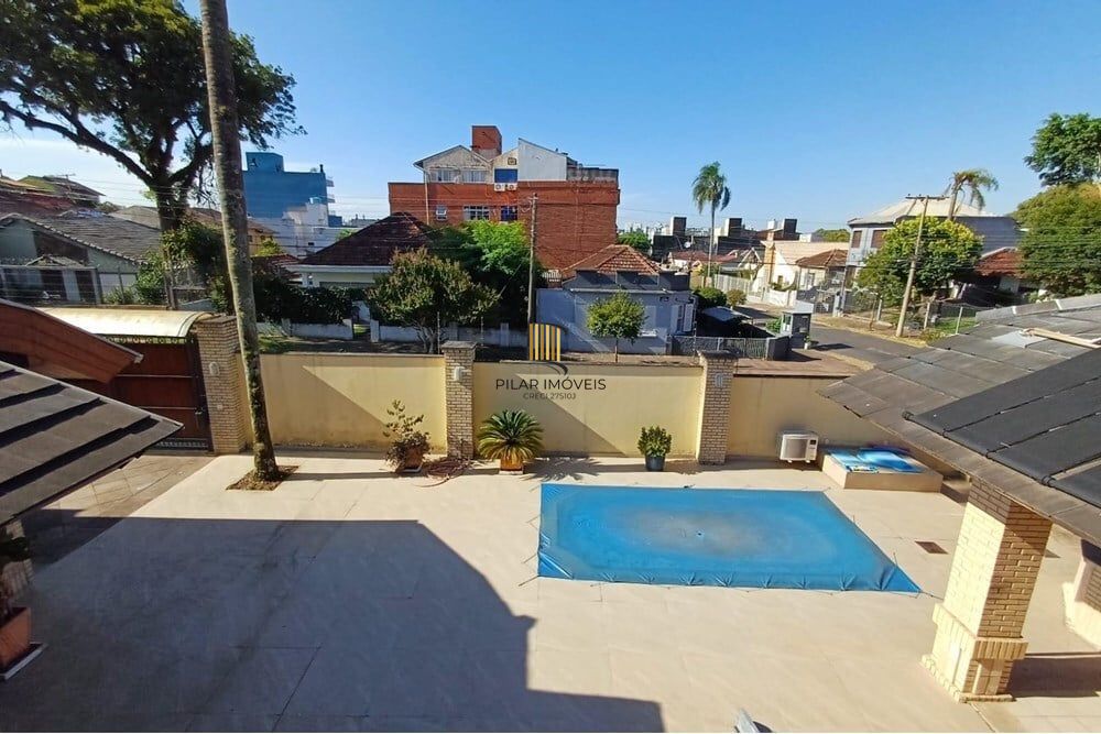 Casa 4 dormitórios no bairro Partenon