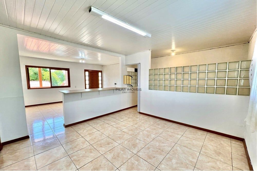 Casa 5 dormitórios no bairro Igara