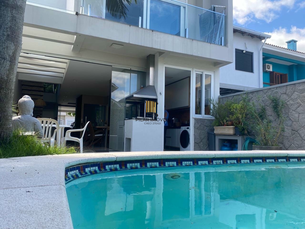 Casa de Condomínio 3 dormitórios no bairro Passo das Pedras