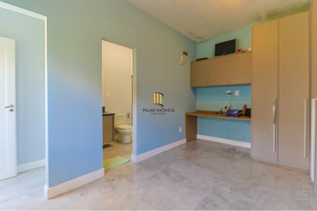 Casa 5 dormitórios no bairro Ipanema