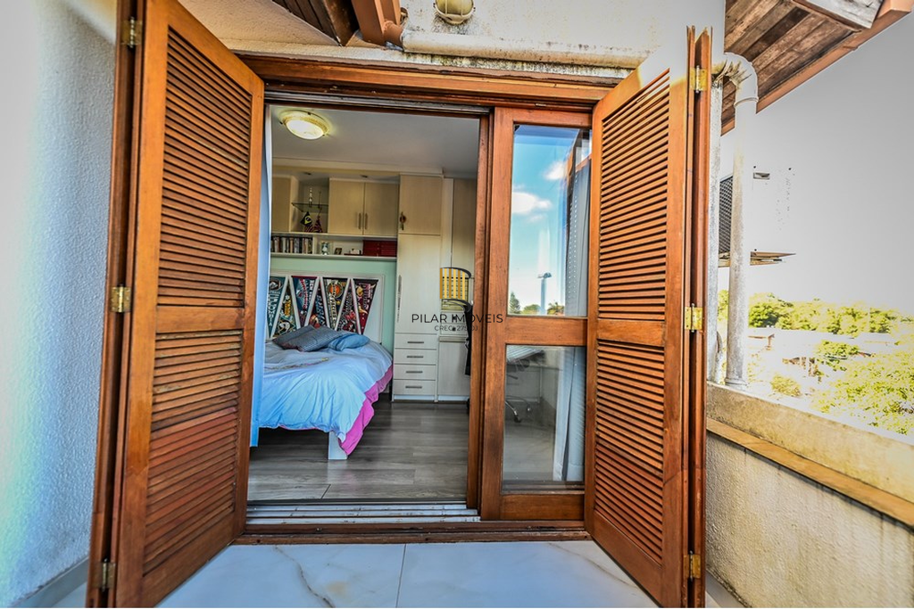 Casa de Condomínio 3 dormitórios no bairro Cavalhada