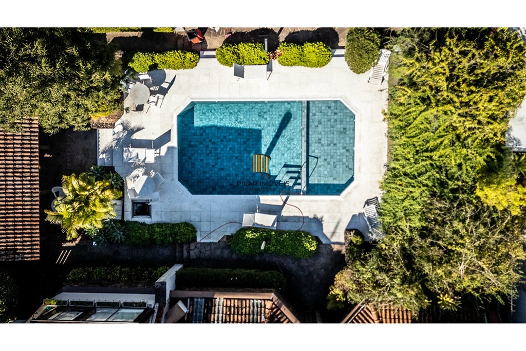 Casa de Condomínio 4 dormitórios no bairro Três Figueiras