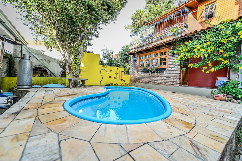 Casa de Condomínio 4 dormitórios no bairro Santa Tereza