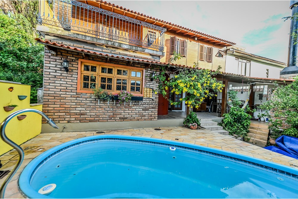 Casa de Condomínio 4 dormitórios no bairro Santa Tereza