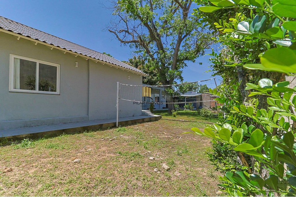 Casa 5 dormitórios no bairro Ipanema