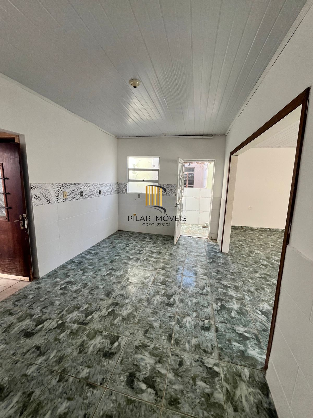 Casa de 2 dormitórios, sendo 1 suíte no Barrio Parque da Matriz, em Cachoeirinha