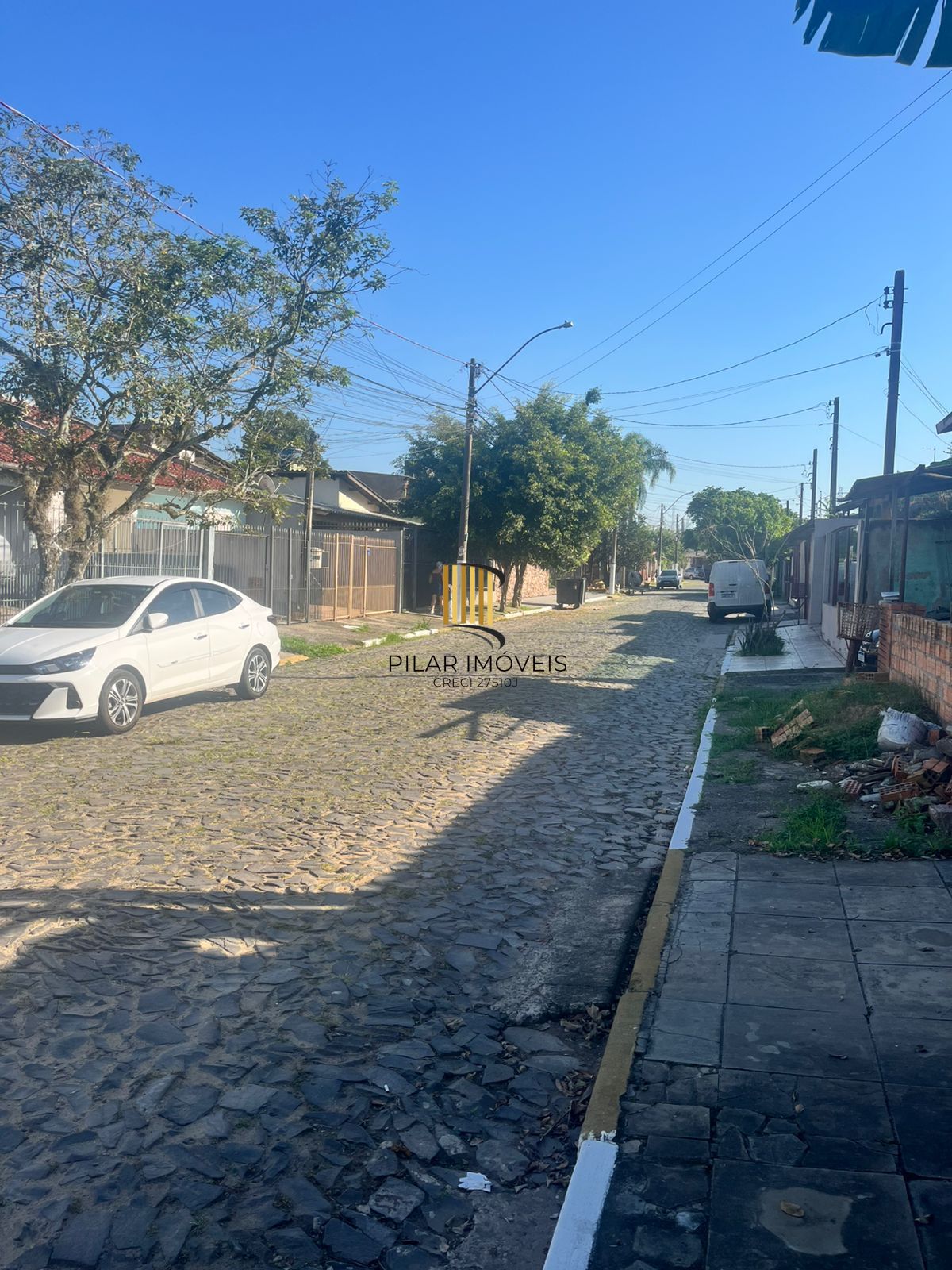 Casa de 2 dormitórios, sendo 1 suíte no Barrio Parque da Matriz, em Cachoeirinha