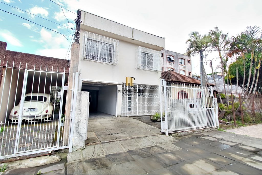 Casa 4 dormitórios no bairro Glória - Pilar Imóveis