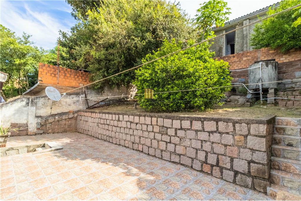 Casa 5 dormitórios no bairro Partenon