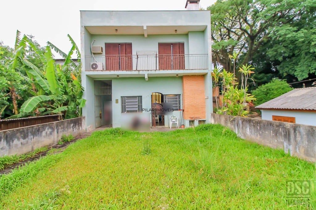 Casa 3 dormitórios no bairro Glória