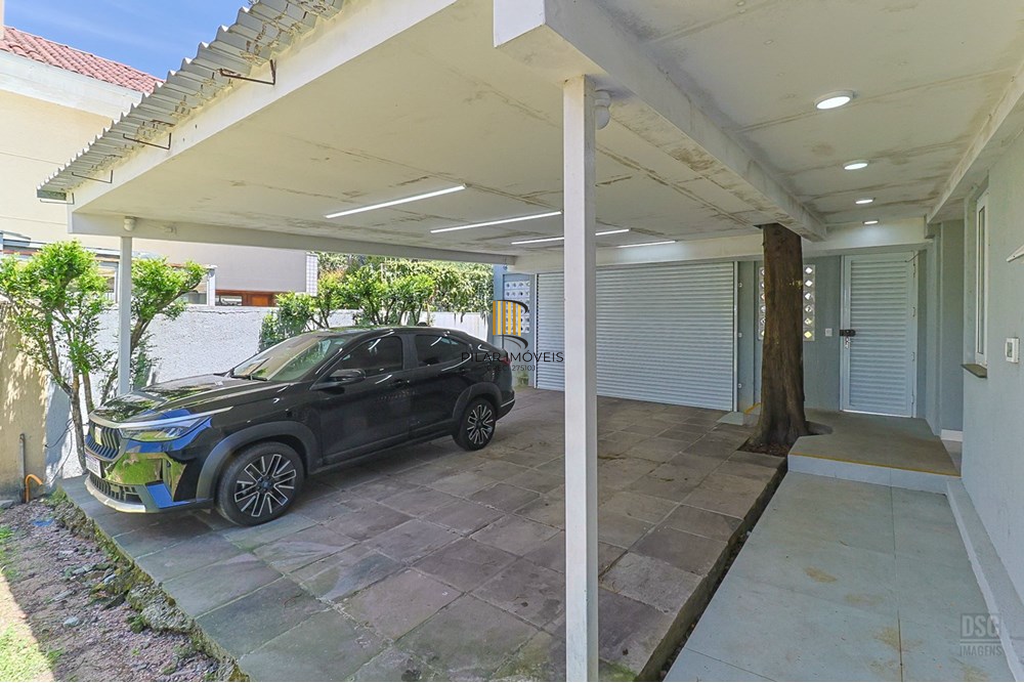 Casa 5 dormitórios no bairro Ipanema