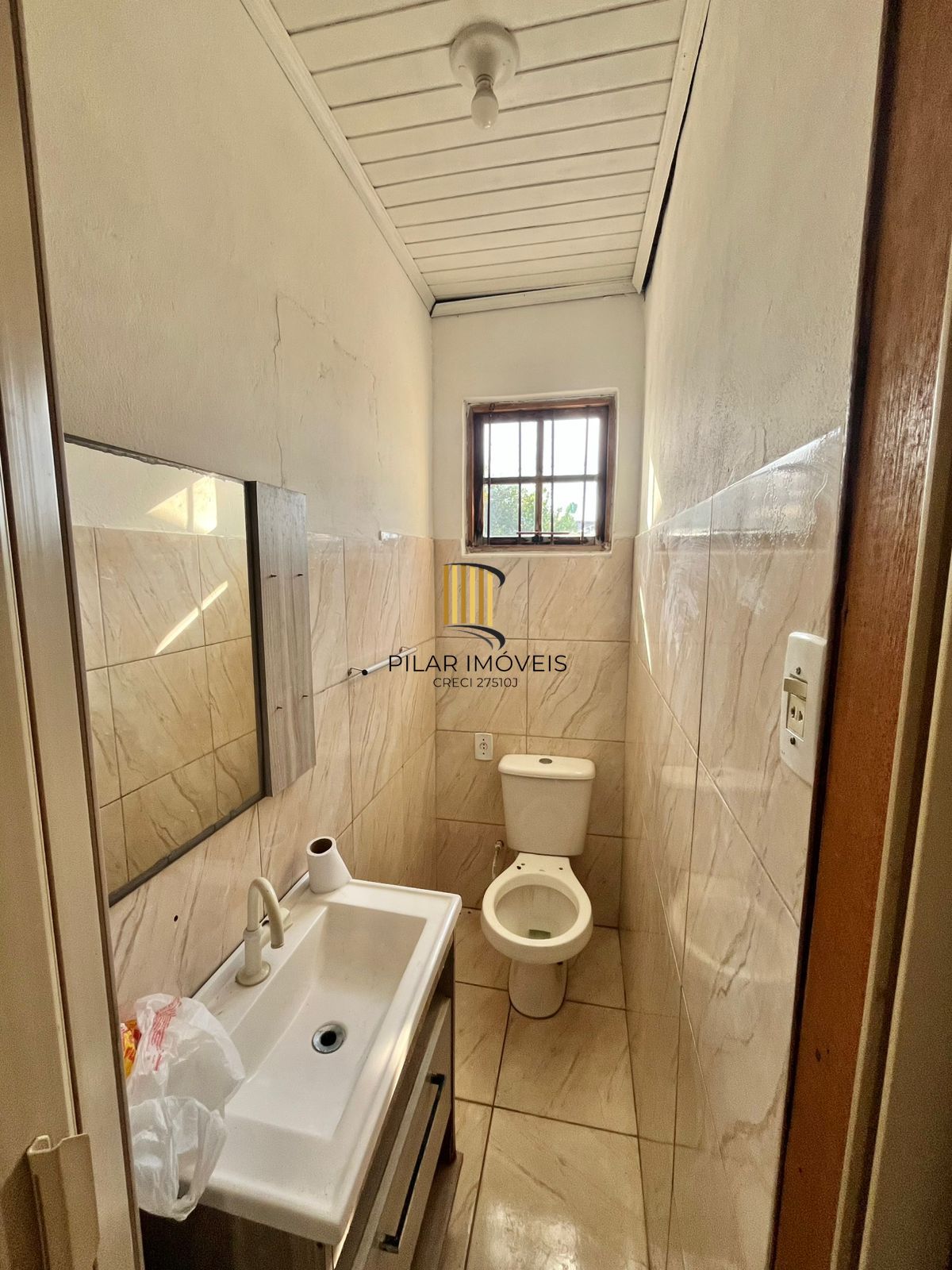 Casa de 2 dormitórios, sendo 1 suíte no Barrio Parque da Matriz, em Cachoeirinha