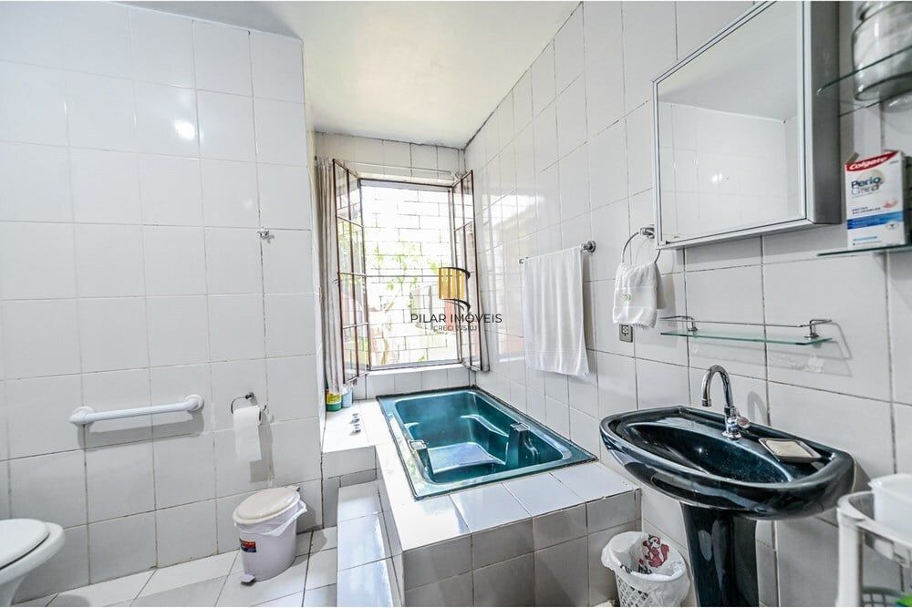 Casa de Condomínio 4 dormitórios no bairro Santa Tereza