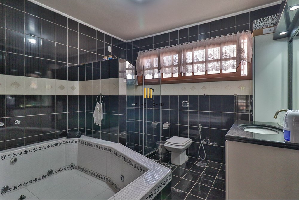 Casa 5 dormitórios no bairro Jardim Lindóia