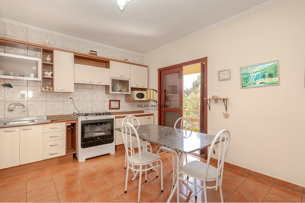 Casa 5 dormitórios no bairro Glória