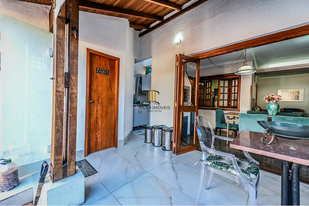 Casa de Condomínio 3 dormitórios no bairro Cavalhada