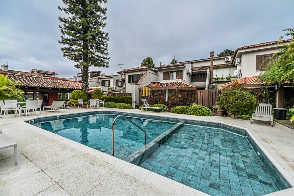 Casa de Condomínio 4 dormitórios no bairro Três Figueiras