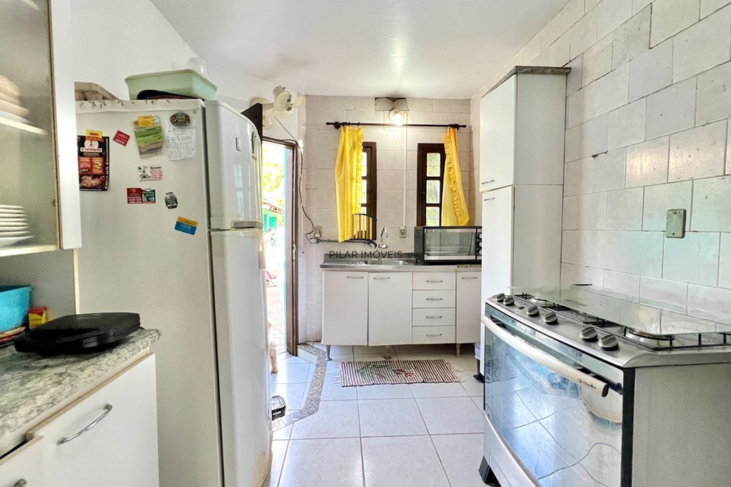 Casa 4 dormitórios no bairro Igara