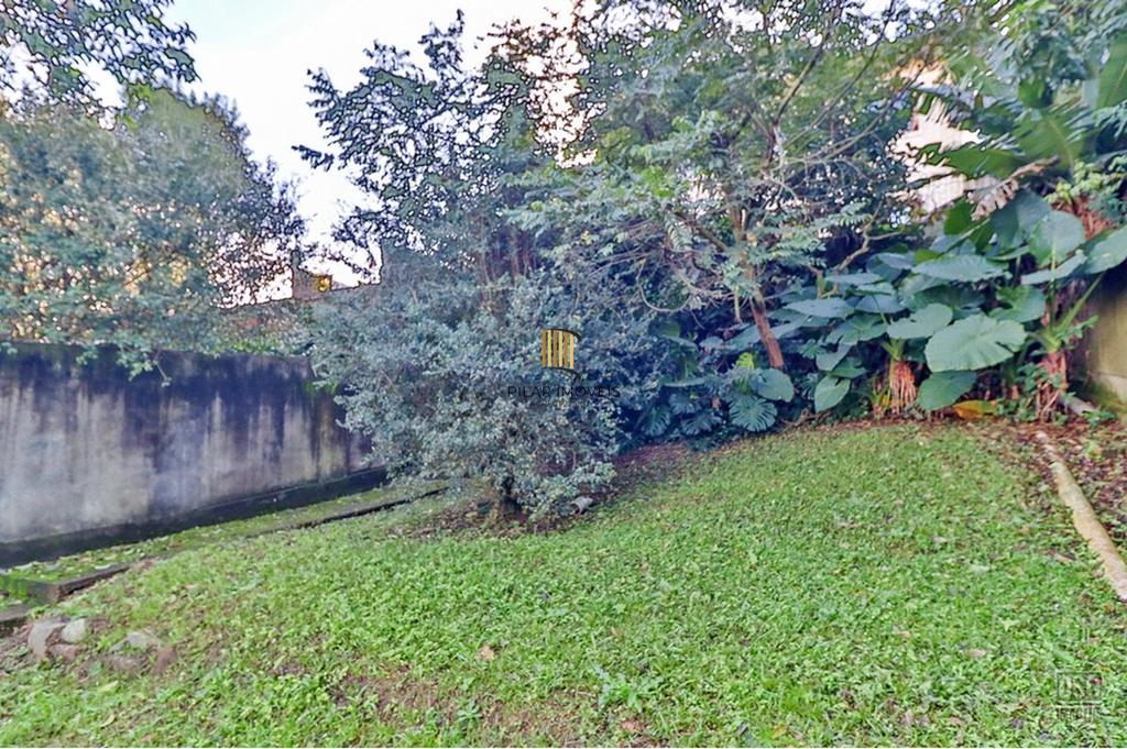 Casa 5 dormitórios no bairro Ipanema