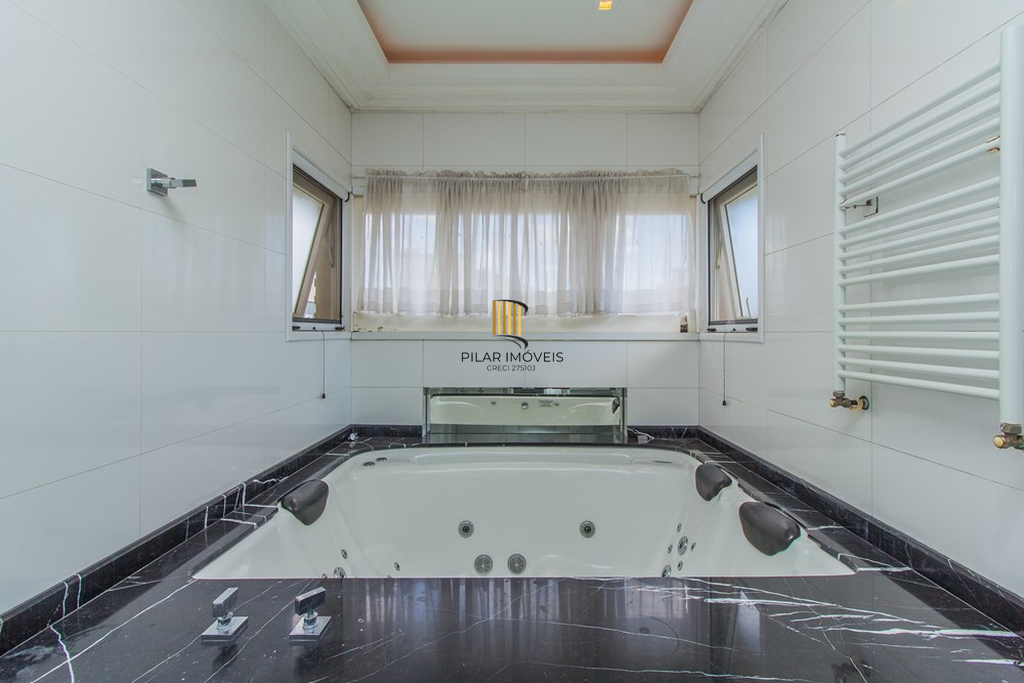 Casa 4 dormitórios no bairro Igara