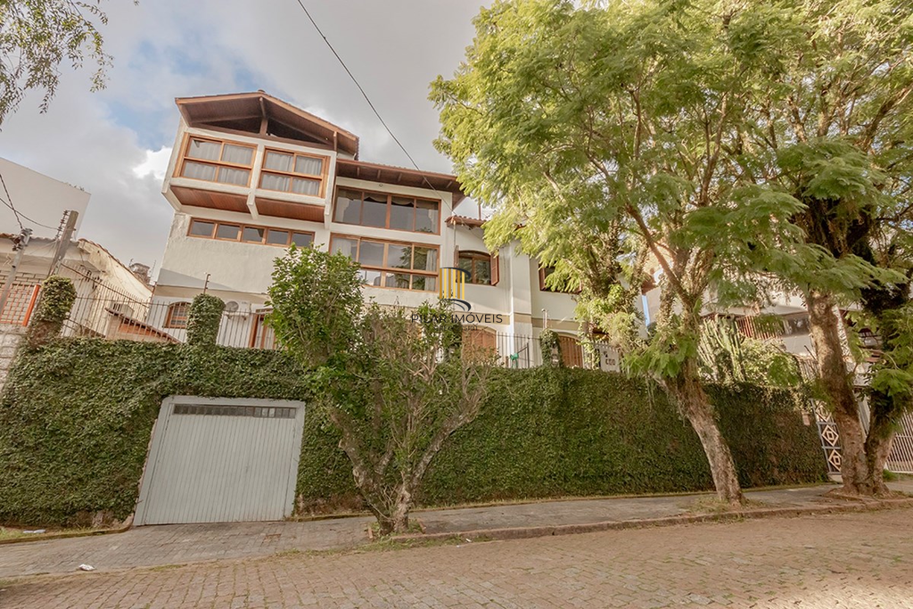 Casa 4 dormitórios no bairro Passo da Areia