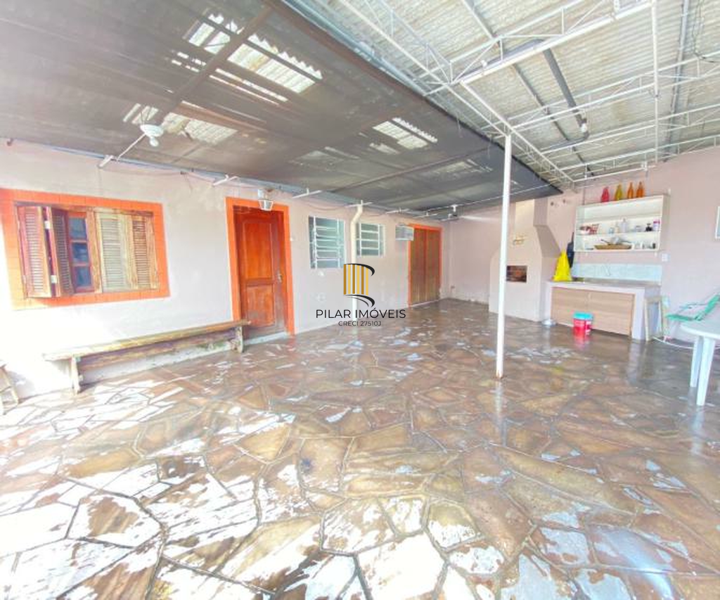 Casa 5 dormitórios no bairro Camaquã